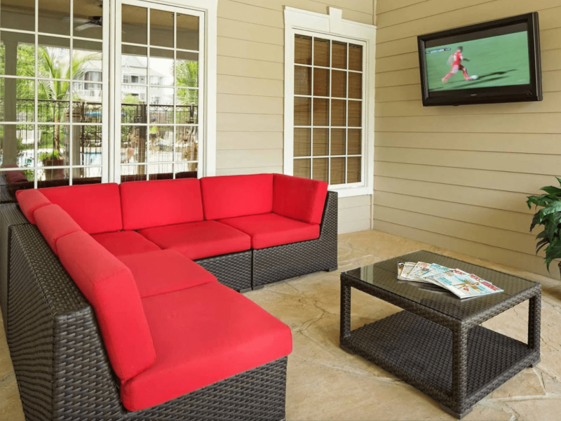 This image shows the community amenities, particularly the outdoor tv lounge featuring its comfy sofas that were ideal for family and friends bond.